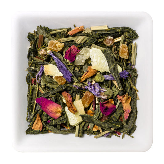 Grüner Tee Tropical Tide mit Mango, Ananas und Kokoschips, fruchtige Mischung mit exotischem Aroma und klarer Tasse
